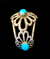 Navajo Handcrafted Sterling Silver and genuine turquoise bracelet by Daniel Mike.