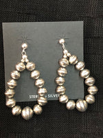Navajo Pearl inspired sterling silver embossed bead earrings, star pattern