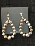 Navajo Pearl inspired sterling silver embossed bead earrings, star pattern