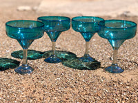 Solid aquamarine hand blown glass in Margarita style with clear glass stem.