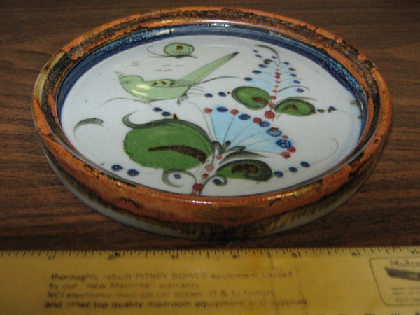 Ken Edwards Pottery small tray with brown rim and  green, blue, and black plants and birds
