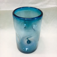 Hand Blown Mexican glass in solid aquamarine with a pinched effect for easy and safe handling.