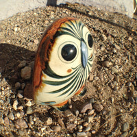 Round face owl in stoneware pottery.