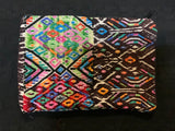 Guatemalan vintage fabric (embroidered) made into a 7” x 10” fully lined bag with zipper.  Both sides are of the same fabric.