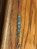 Navajo Handcrafted Sterling Silver and Kingman Turquoise leather bracelet.  NLB  9.5"